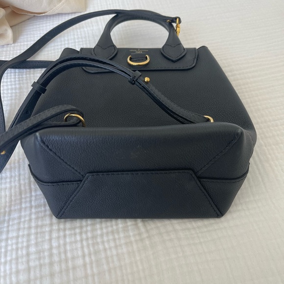 Authentic Louis Vuitton Lock Me Mini Backpack Black and Gold - Picture 14 of 16